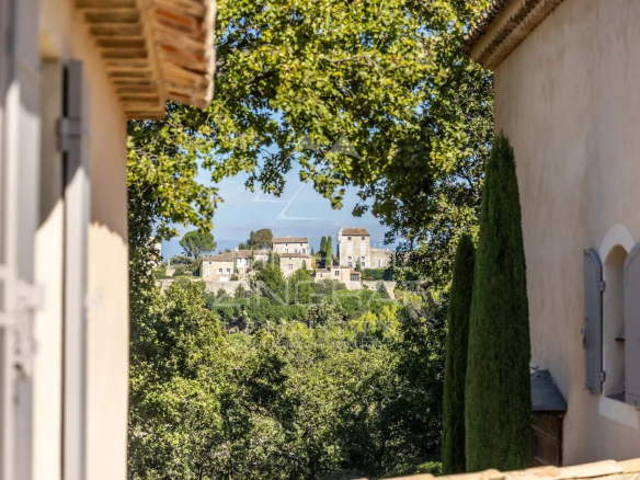 Panoramic view of the village of Ménerbes from a Provençal bastide.