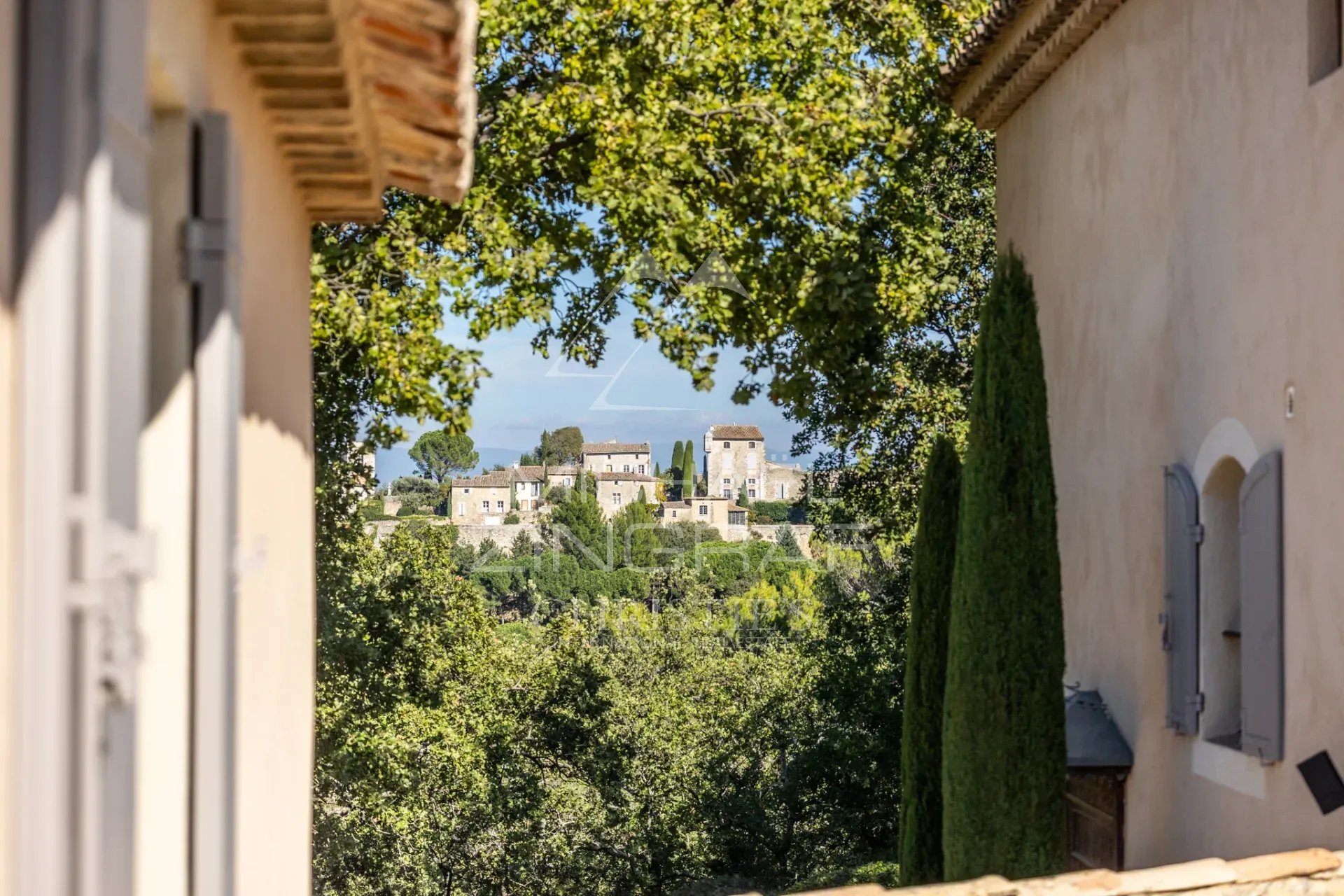 Provençal country house in Ménerbes Panoramic view of the village of Ménerbes from a Provençal bastide.