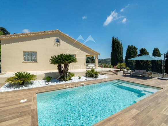 Renovated single-storey villa with village view
