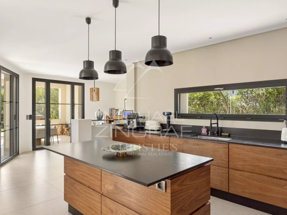 Modern and bright kitchen of a contemporary villa in Saint-Paul-de-Vence.