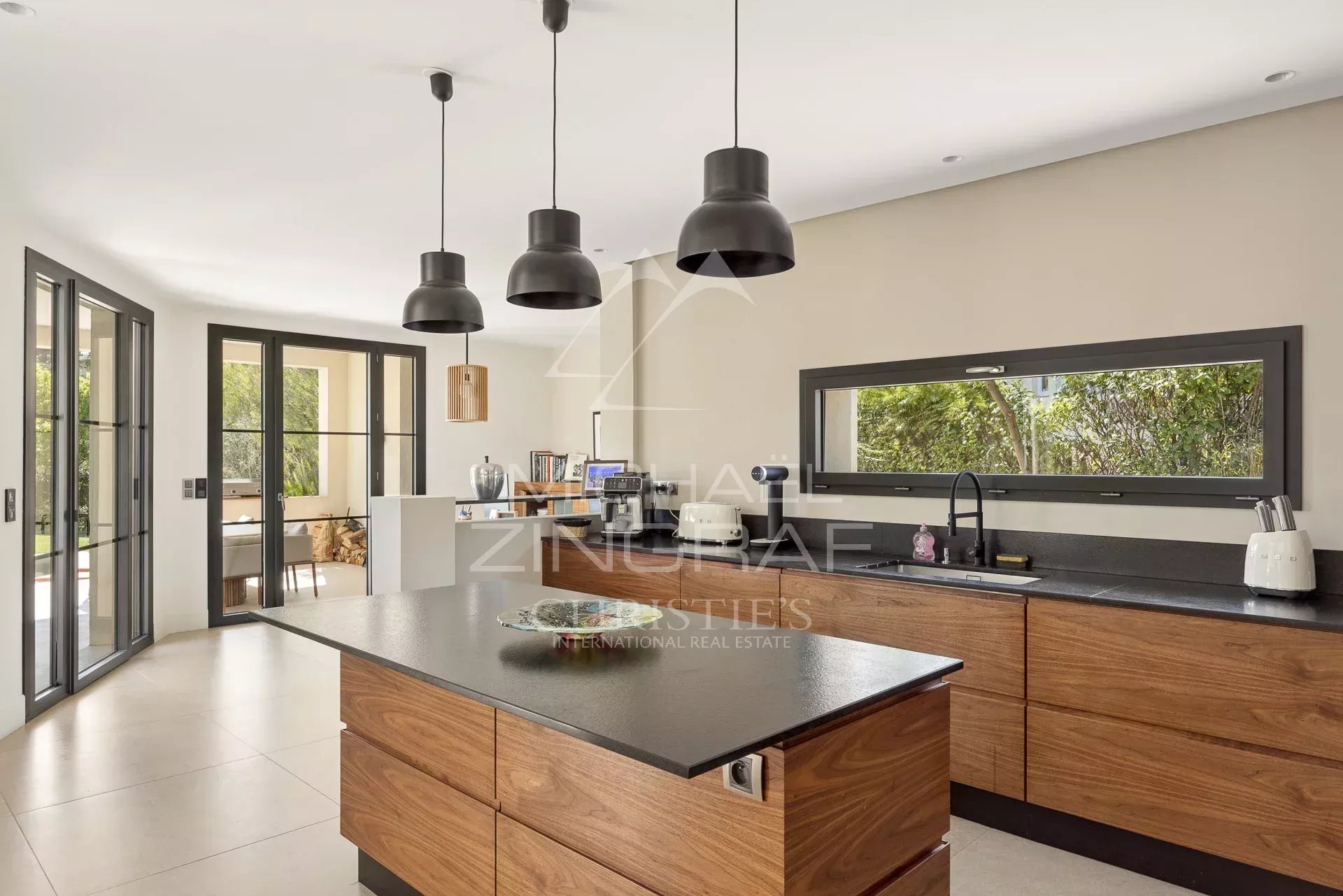 Modern and bright kitchen of a contemporary villa in Saint-Paul-de-Vence.