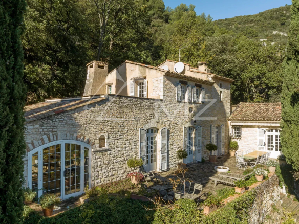 Stone manor house with garden in Tourrettes-sur-Loup, surrounded by trees