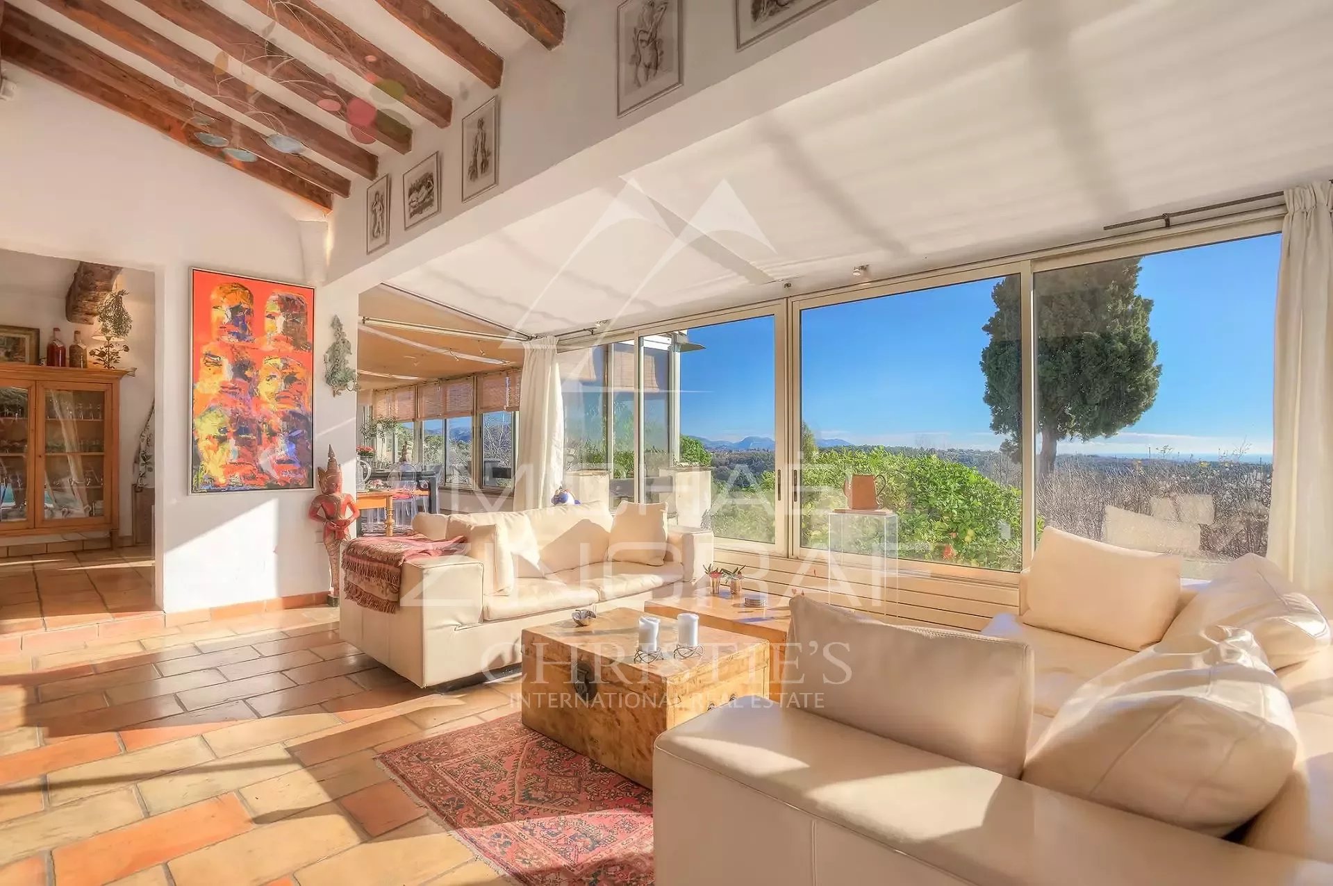 Interior of a villa in Vence Interior of a Provençal villa in Vence with sea view, bright living room and warm decor.