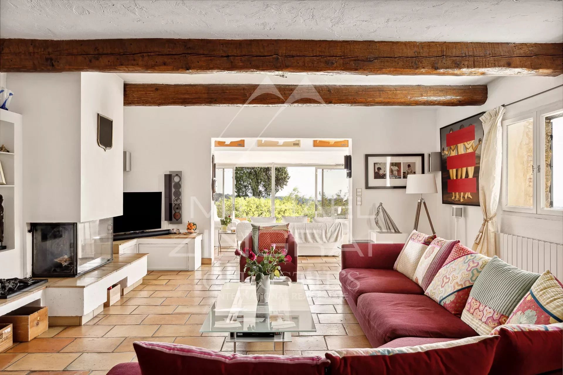 Interior of a villa in Vence Interior of a Provençal villa in Vence with a bright living room and colorful sofas.