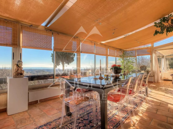 Bright dining room with sea view in Vence, Provence.