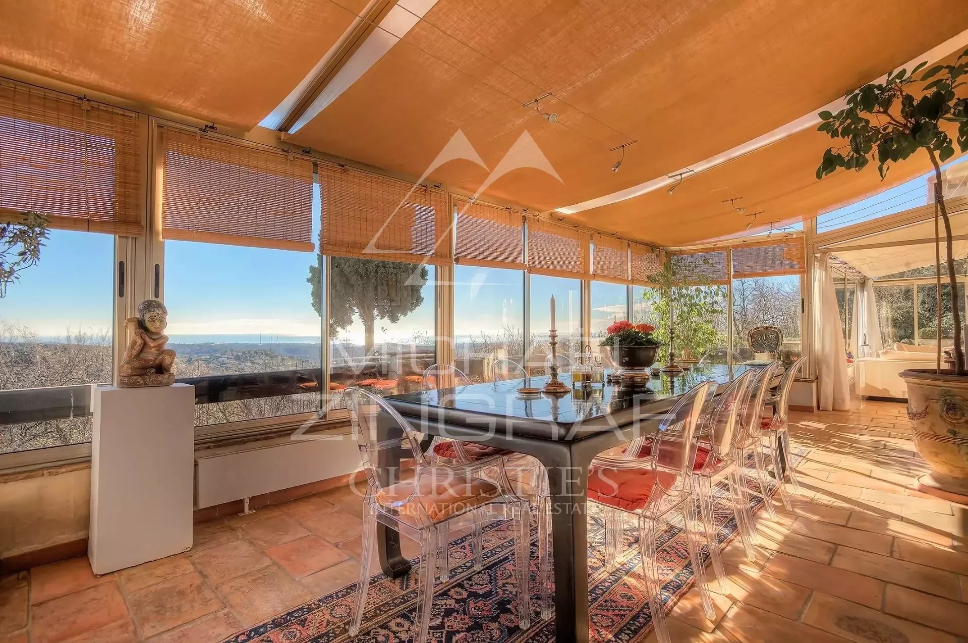 Dining room with panoramic views in Vence Bright dining room with sea view in Vence, Provence.