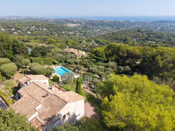 Aerial view of a villa with swimming pool and landscaped grounds in Saint-Paul-de-Vence.