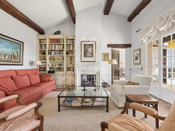 Interior of a villa with a bright living room and comfortable furniture.