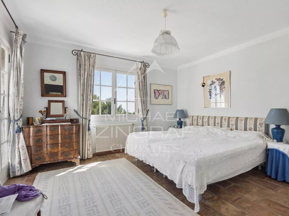Room in a villa in Saint-Paul-de-Vence with unobstructed views and warm decor.