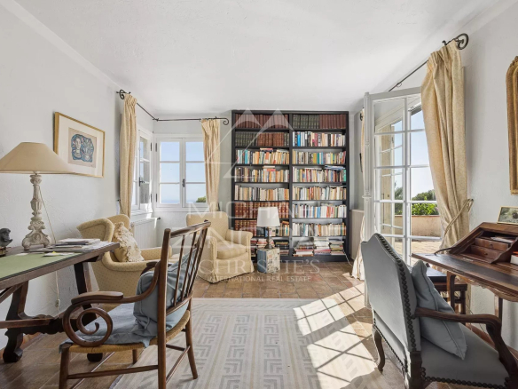 Interior of a villa in Saint-Paul-de-Vence with library and workspace.