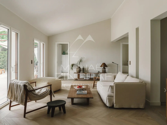 Interior of a renovated villa with a bright and modern living room.