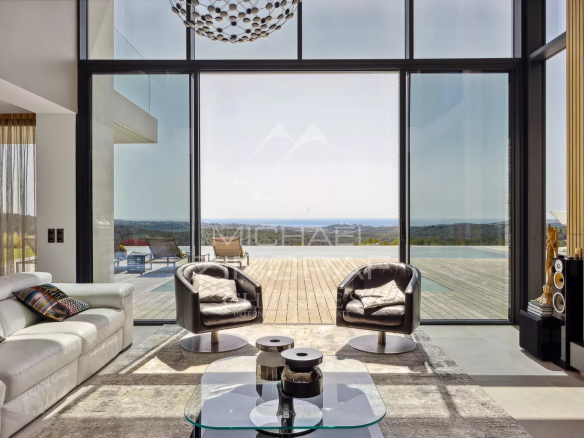 Interior of a contemporary villa in Roquefort-les-Pins with sea view.
