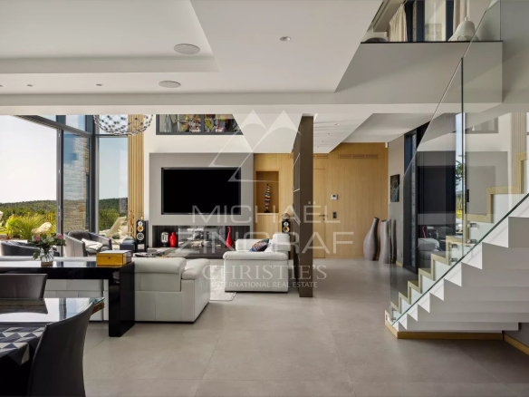 Interior of a contemporary villa in Roquefort-les-Pins with sea view.