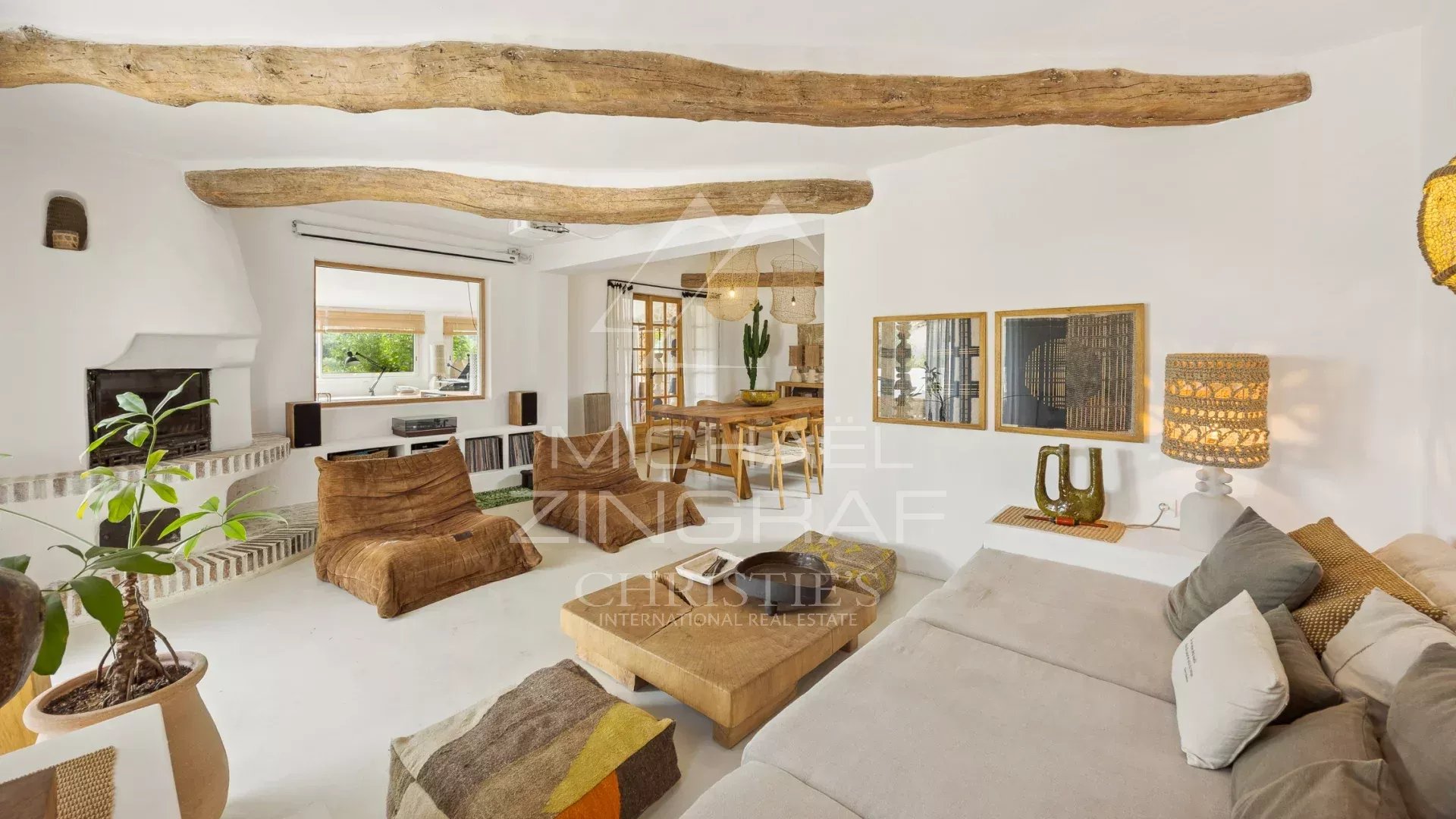 Interior of a villa in Le Rouret Interior of a Mediterranean villa with exposed beams and soothing decor.