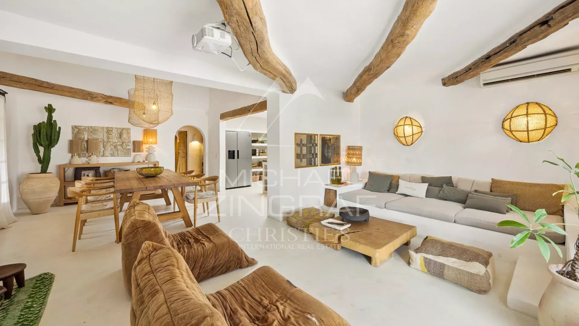 Interior of a Mediterranean villa Interior of a Mediterranean villa in Le Rouret with a bright living room and wooden elements.