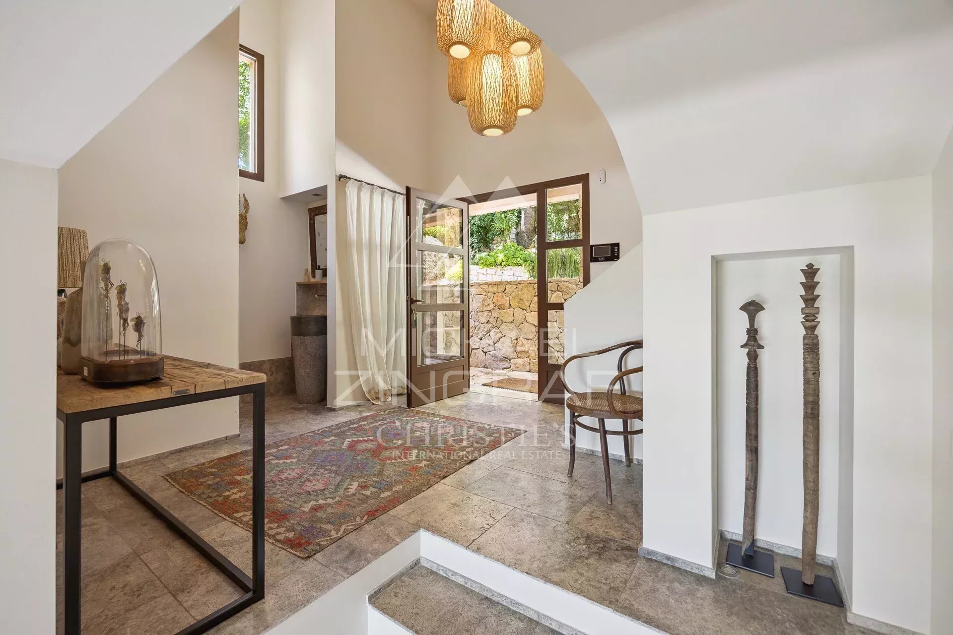 Interior of a modern Mediterranean villa with elegant decorative elements.