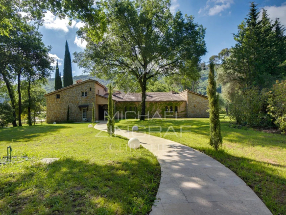 Renovated stone property surrounded by greenery in Le Bar-sur-Loup