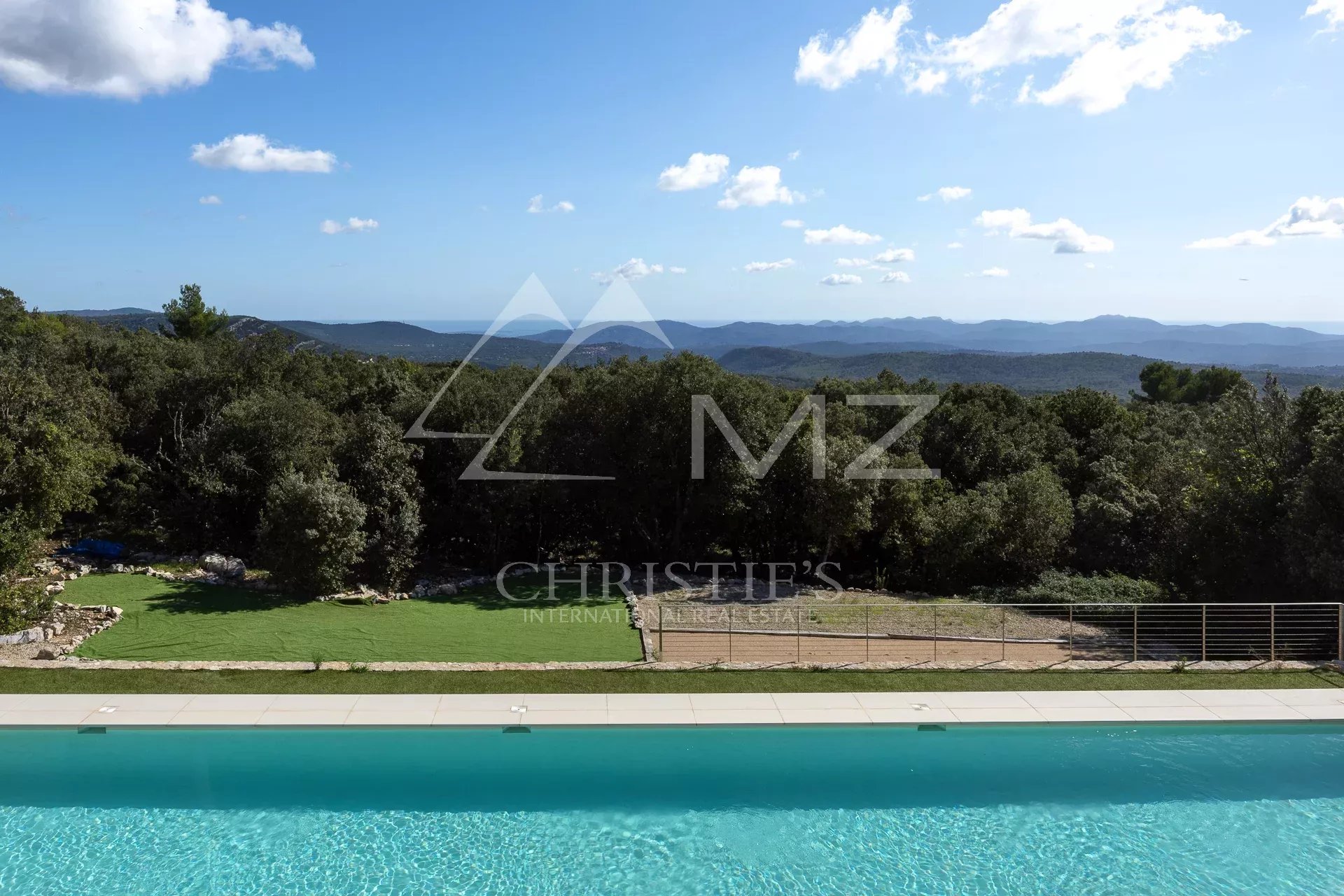Panoramic view of nature from a villa with swimming pool in Fayence.
