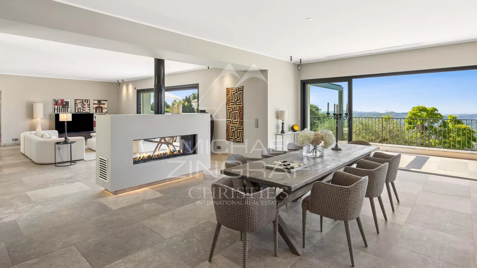 Villa interior with sea view Interior of a modern villa with sea view, living room and dining room.