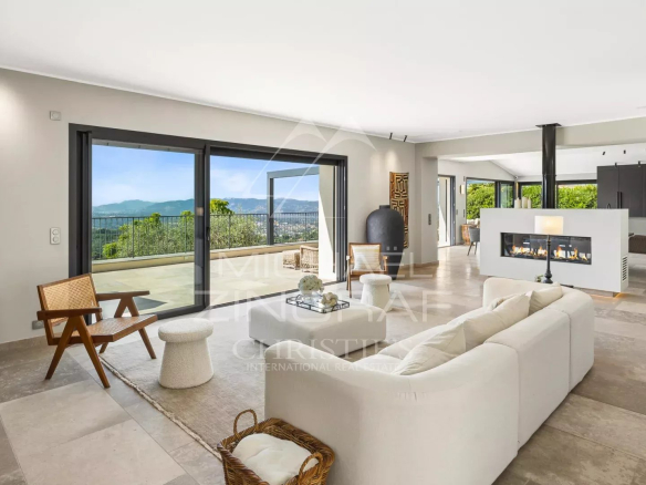 Interior of a modern villa with sea views, bright and open living room.