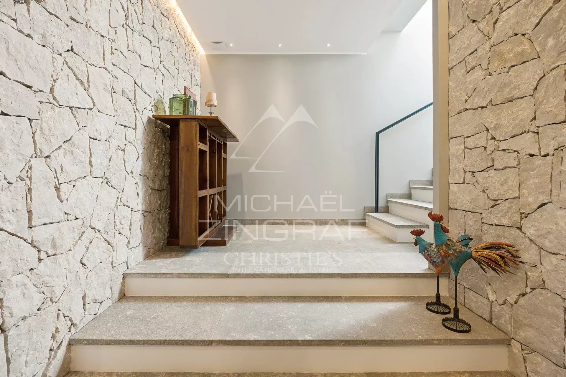 Interior of a villa in Châteauneuf-Grasse Interior of a villa with staircase and stone walls in Châteauneuf-Grasse.