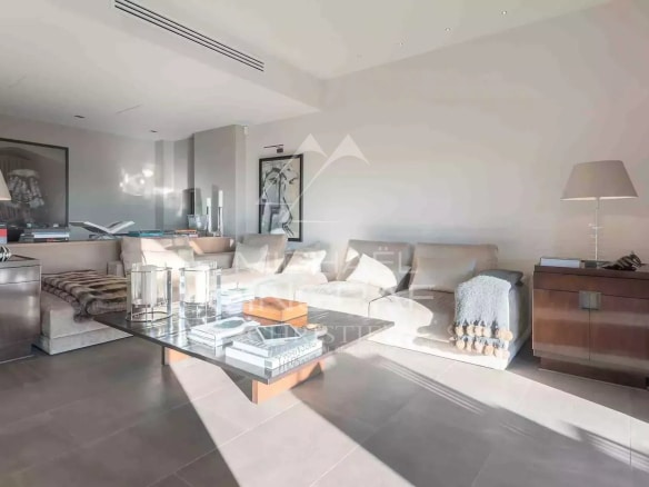 Interior of a renovated country house with a bright and modern living room.