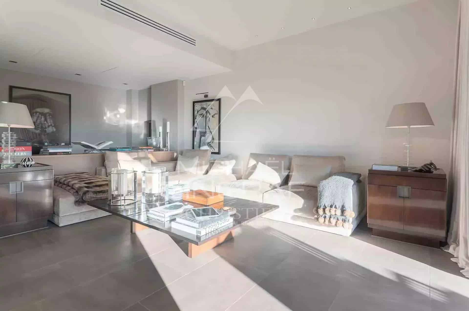 Living room of a country house in Mougins Interior of a renovated country house with a bright and modern living room.