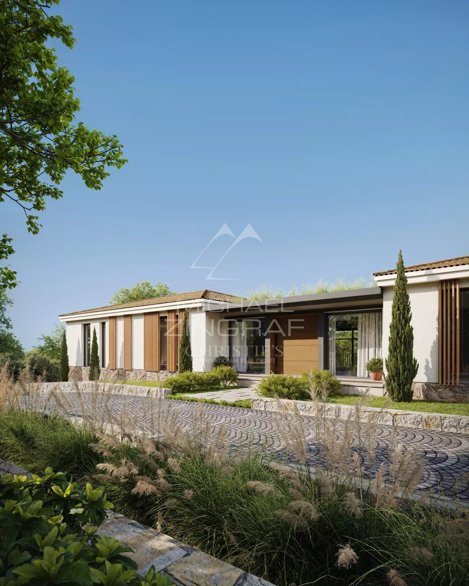 Contemporary country house in Mougins with views of the hills and the old village.