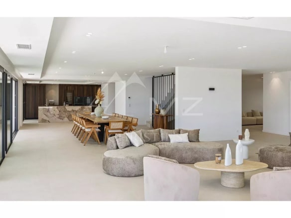 Interior of a contemporary villa with spacious living room and dining room, Les Issambres.
