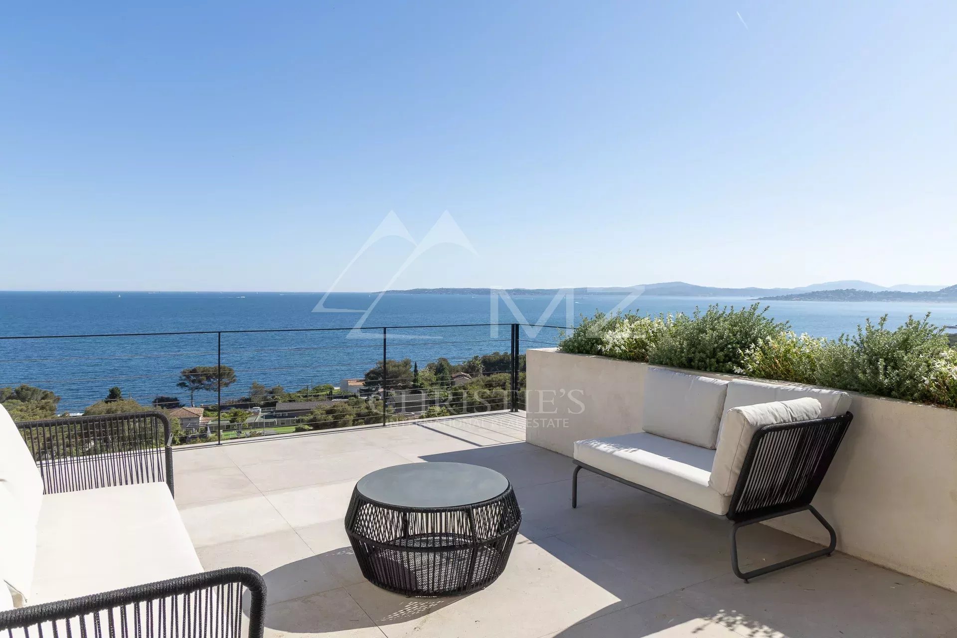 Terrace with sea view and modern furniture in Les Issambres