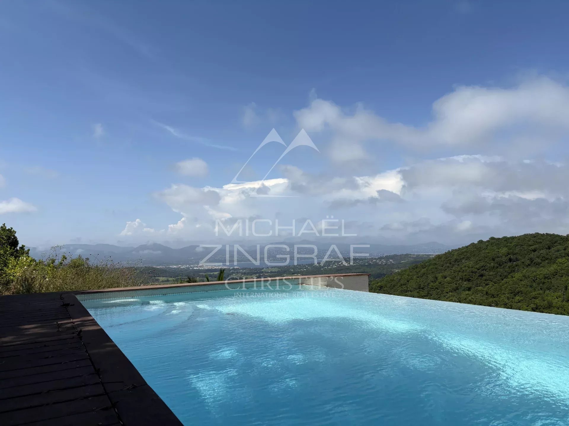 Sea view from a villa in Saint-Tropez Panoramic view of the Mediterranean Sea from a villa with an infinity pool.