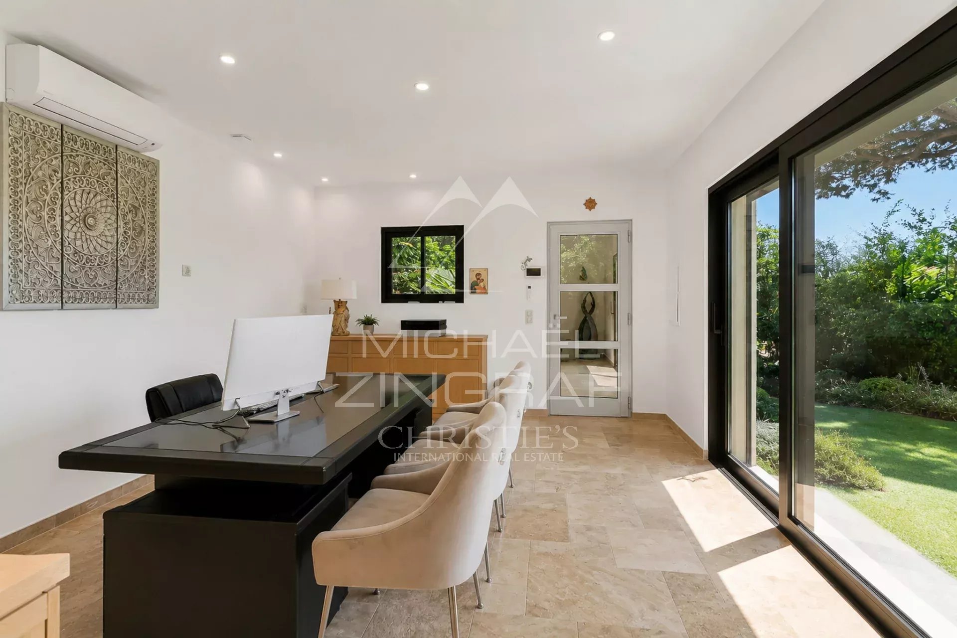 Interior of a villa in Sainte-Maxime Interior of a modern villa in Sainte-Maxime with office and access to the garden.