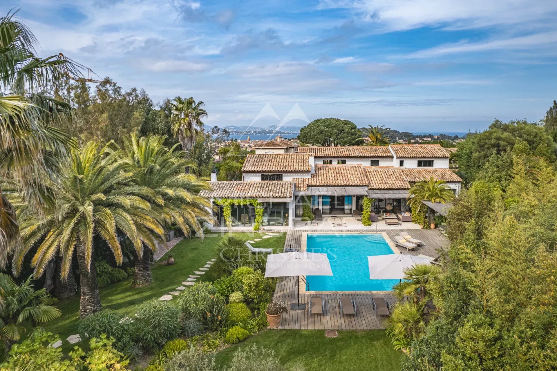 Provençal property in Saint-Tropez Aerial view of a Provençal property with swimming pool and garden in Saint-Tropez.