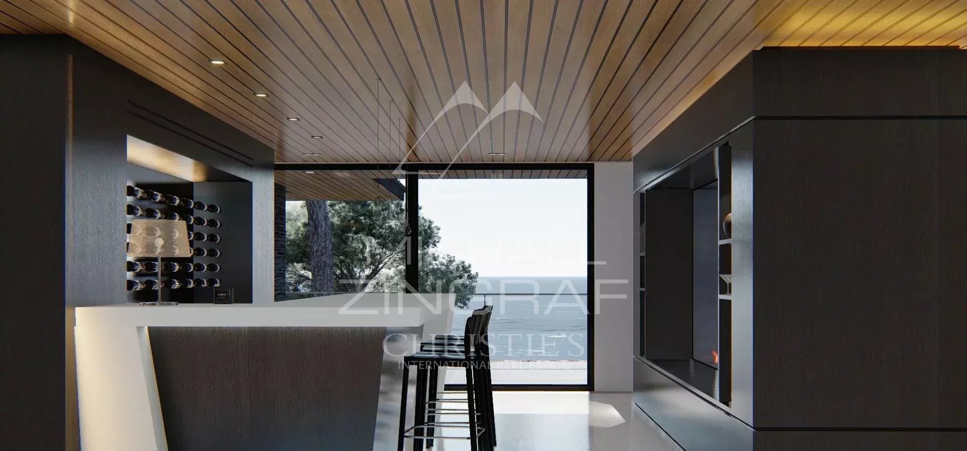 Intérieur d’une propriété au Lavandou Intérieur moderne d'une propriété avec bar et vue sur la mer au Lavandou.
