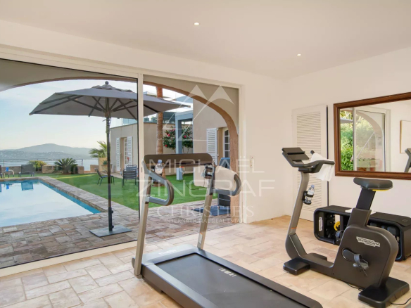 Interior of Villa Levante with view of the pool and the Gulf of Saint-Tropez.