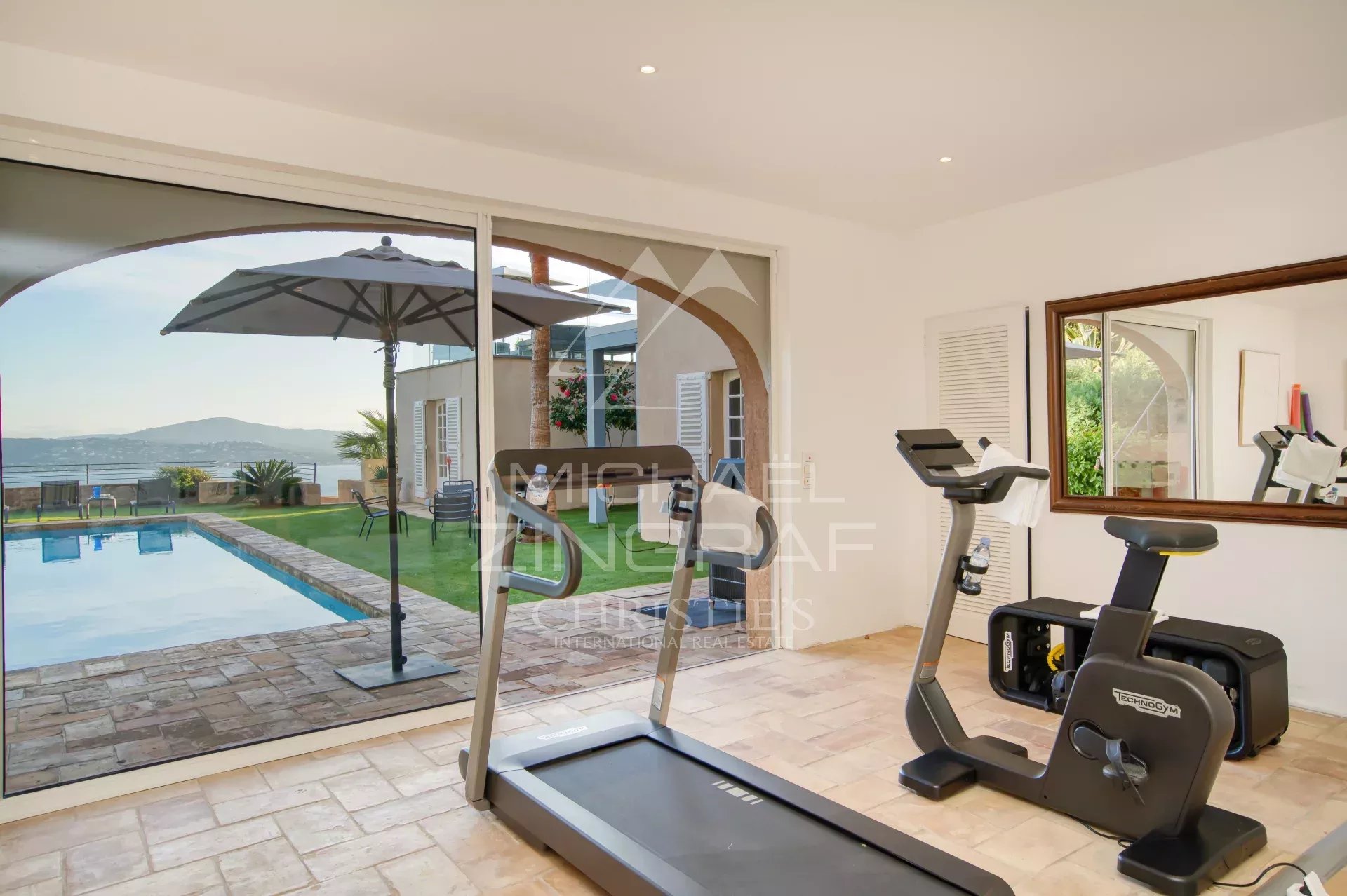Interior of Villa Levante Interior of Villa Levante with view of the pool and the Gulf of Saint-Tropez.