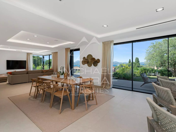 Interior of a contemporary villa in Saint-Tropez with sea views and large bay windows.