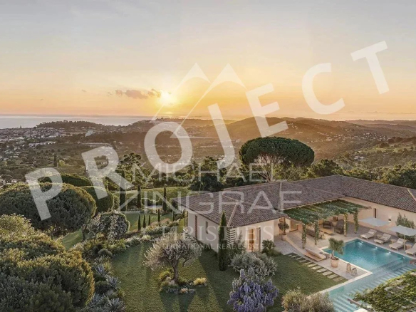 Panoramic view of the sea and the villa in a landscaped garden near Saint-Tropez.