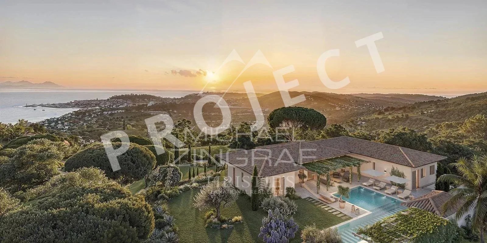 Villa with sea view in Gassin Panoramic view of the sea and the villa in a landscaped garden near Saint-Tropez.