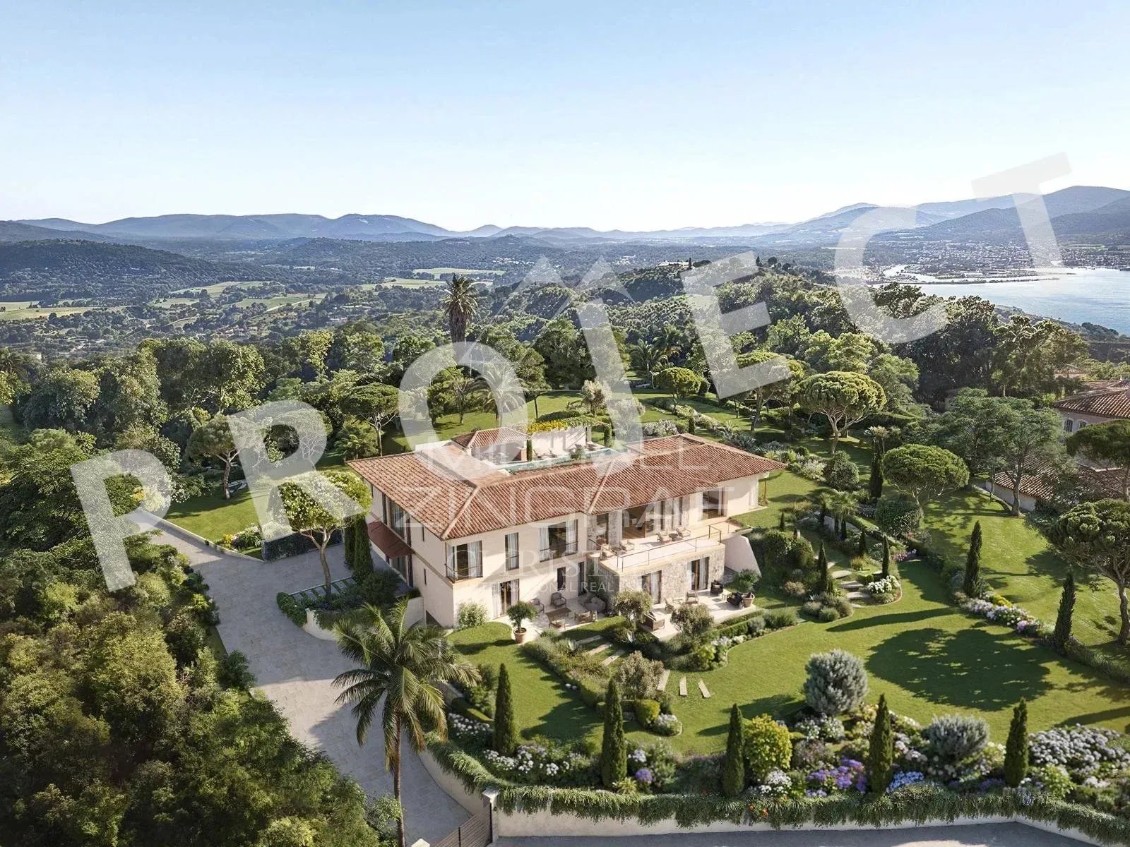 Villa with panoramic sea views Aerial view of a villa with landscaped garden and sea view, near Saint-Tropez.