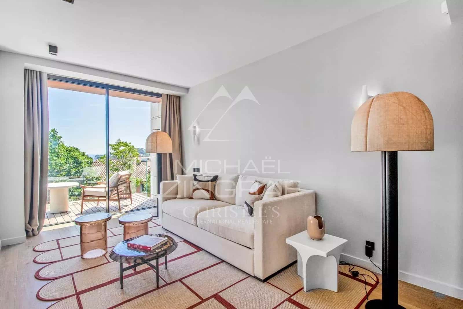Interior of a contemporary villa with a bright and modern living room in Saint-Jean-Cap-Ferrat.