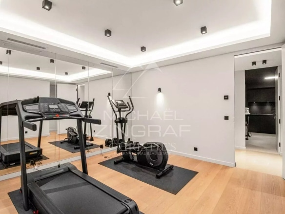 Modern gym with treadmill and exercise bike
