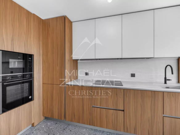 Modern and fully equipped kitchen in a renovated apartment in Villefranche-sur-Mer.