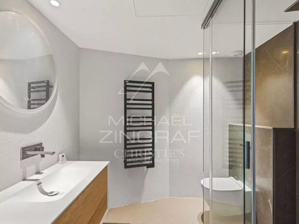 Modern bathroom with shower and sink in a new apartment in Cap d'Ail.