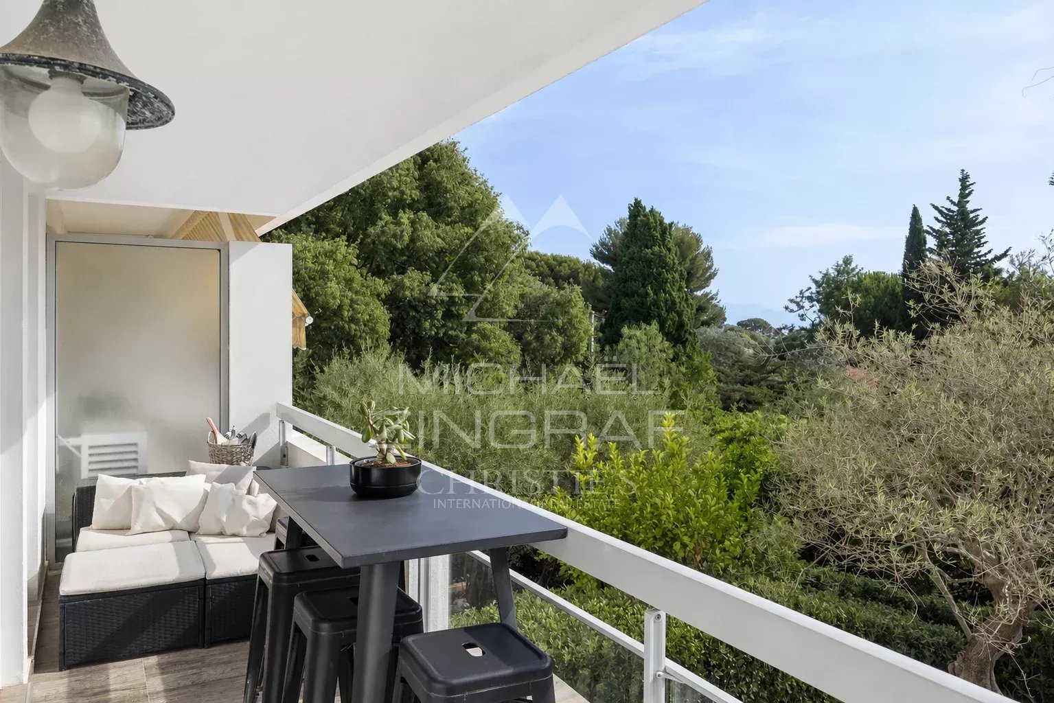 Apartment balcony in Cap d'Antibes Balcony of an apartment overlooking a wooded park in Cap d'Antibes.