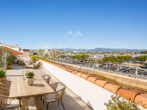 Apartment terrace with panoramic views of the port of Antibes and the city.