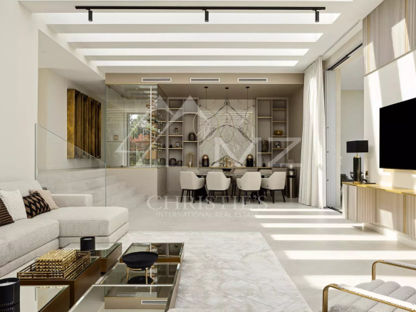 Modern interior of a luxury villa in Antibes with bright living room and open living space.