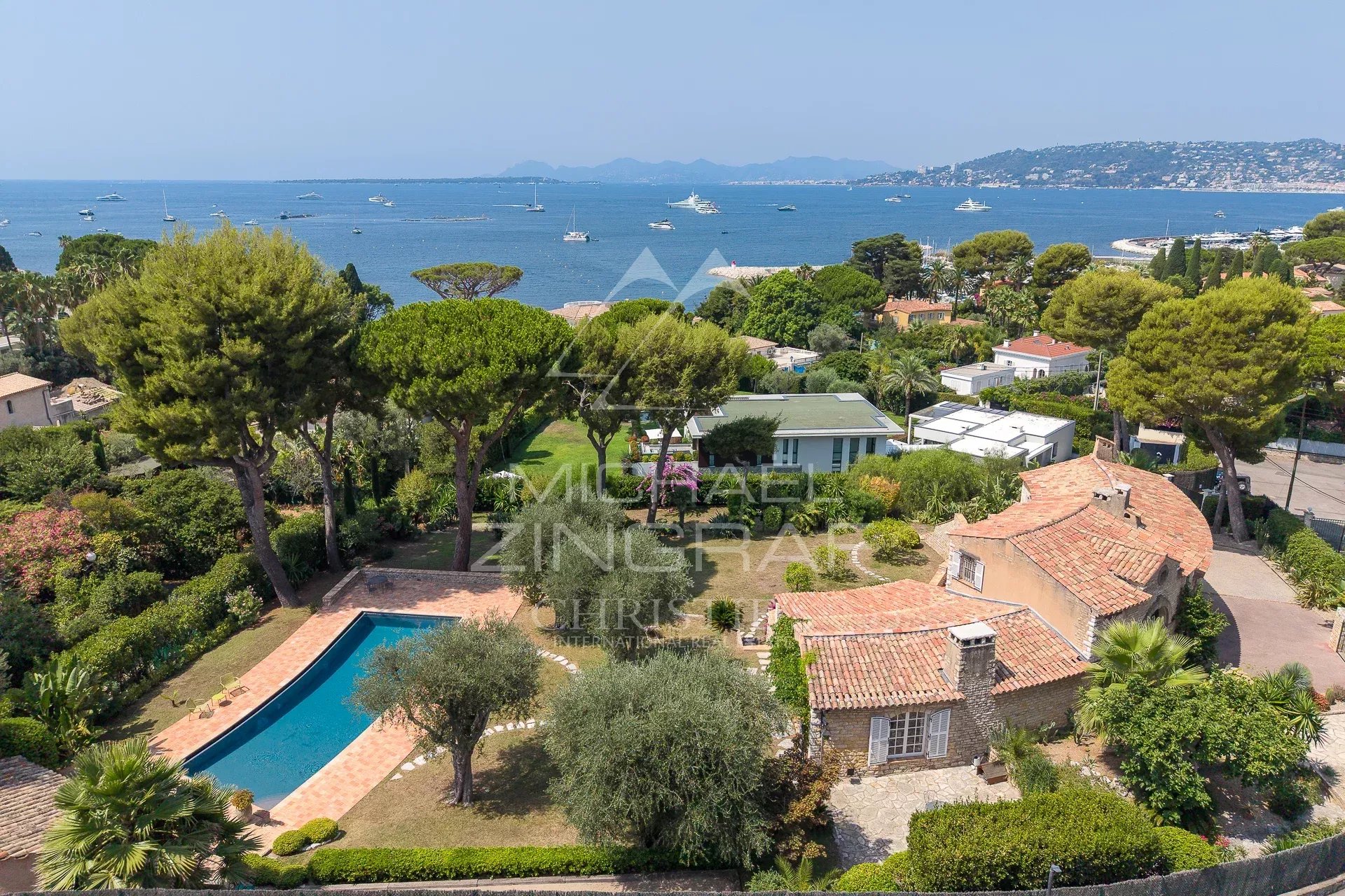 Provençal property in Cap d'Antibes Aerial view of a Provençal property with swimming pool and sea view in Cap d'Antibes.