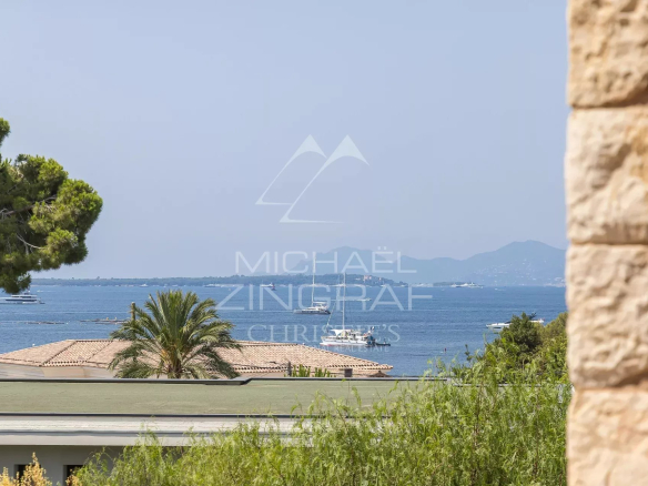 Panoramic sea view from a property in Cap d'Antibes, with boats on the water.