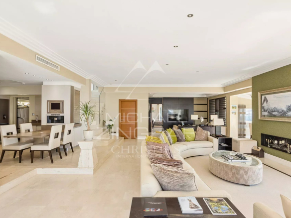 Interior of an elegant villa with a spacious living room and modern decor in Cap d'Antibes.